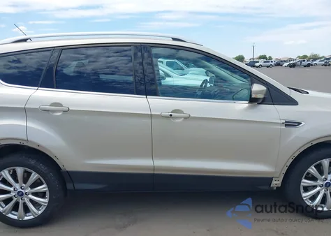 2017 Ford Escape Titanium z USA, uszkodzony, nr VIN 1FMCU0JD7HUD84006